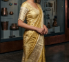 Picture of Gold and cream Kanchi tissue saree