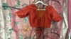 Picture of Peach color tissue Organza Saree with Zari Kota weave look With rust color bluse