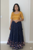 Picture of Combo: Teal blue lehenga with velvet crop top and Navy blue netted lehenga with benaras blouse