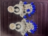 Picture of Statement kundan jhumkas and earrings combo 