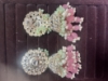 Picture of Statement kundan jhumkas and earrings combo 
