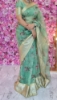 Picture of Sea green floral organza saree