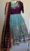 Picture of Sea green and violet half saree