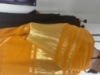 Picture of Brand new pure Gorgette black saree with yellow pure gajji  silk pallu saree with tags