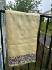 Picture of yellow kota saree with intricate embroidery 