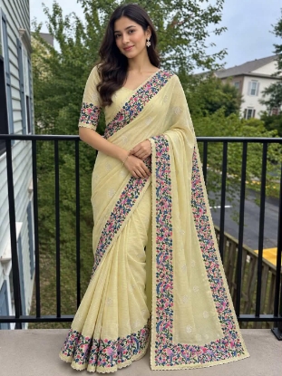 Picture of yellow kota saree with intricate embroidery 