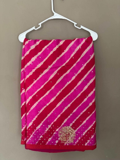 Picture of Tussar leheriya saree with gotapatti work